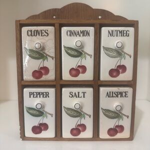 Antique spice rack with cherry design